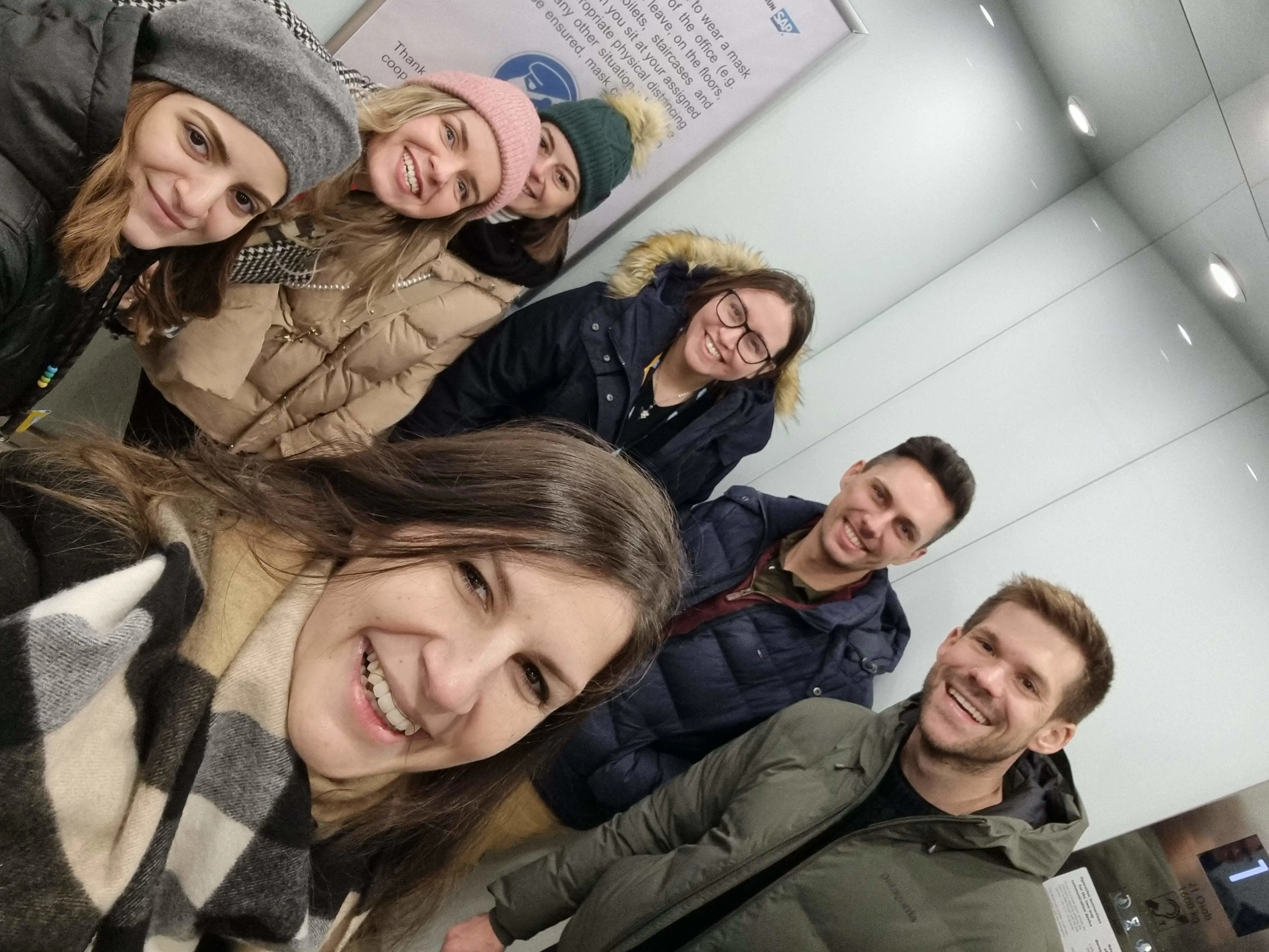 Martina and team in an elevator